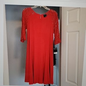 Gabby Skype Red Dress with 3/4 lace sleeves.